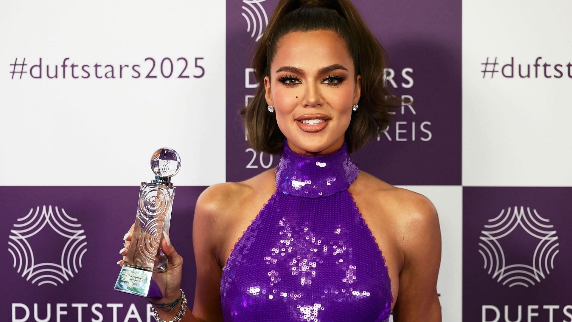 Khloé Kardashian poses with the award at the annual German Perfume Award Duftstars at Rheinterrasse on May 08, 2025, in Duesseldorf, Germany. (Image via Getty/Andreas Rentz)